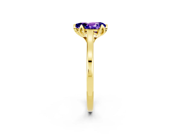 Yellow gold Pear Cut Tanzanite Solitaire Ring with Flower Prong Setting and Classic Band