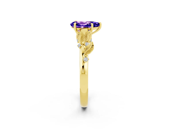 Yellow gold Pear Cut Tanzanite Solitaire Ring with Leaf Motif Band and Four-Prong Setting