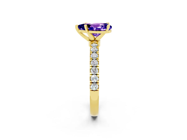 Yellow gold Pear Cut Tanzanite Solitaire Ring with Pavé Accents and Four-Prong Setting