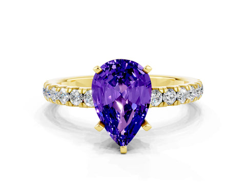 Yellow gold Pear Cut Tanzanite Solitaire Ring with Pavé Accents and Four-Prong Setting