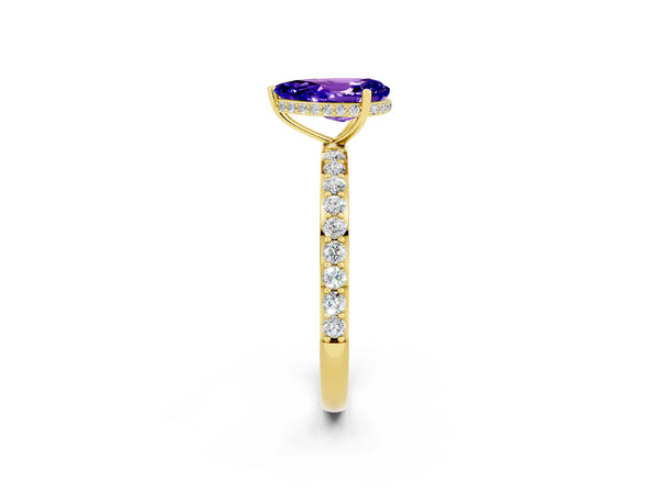 Yellow gold Pear Cut Tanzanite Solitaire Ring with Pavé Band and Hidden Halo