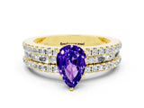 Yellow gold Pear Cut Tanzanite Solitaire Ring with Pavé and Channel Set Band