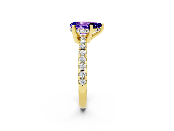 Yellow gold Pear Cut Tanzanite Solitaire Ring with Round  Pavé Band and Four-Prong Setting