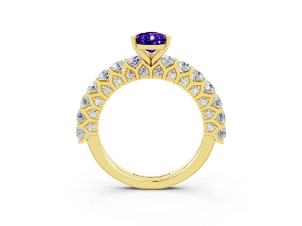 Yellow gold Pear Cut Tanzanite Solitaire Ring with Shared Prong Pavé Band and Four-Prong Setting