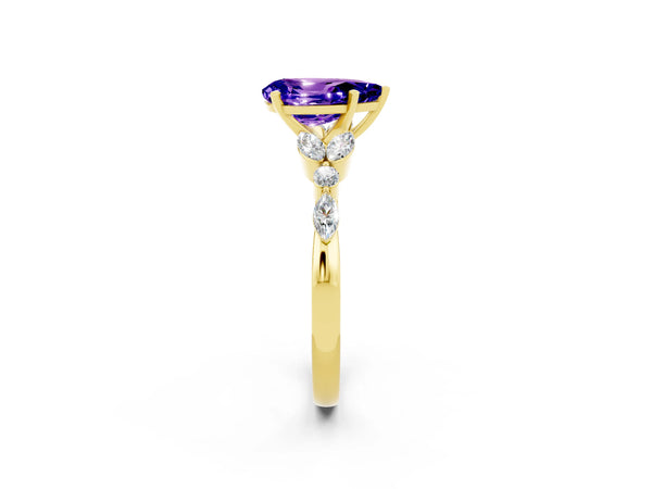 Yellow gold Pear Cut Tanzanite Solitaire Ring with Side Stones and Four-Prong Setting