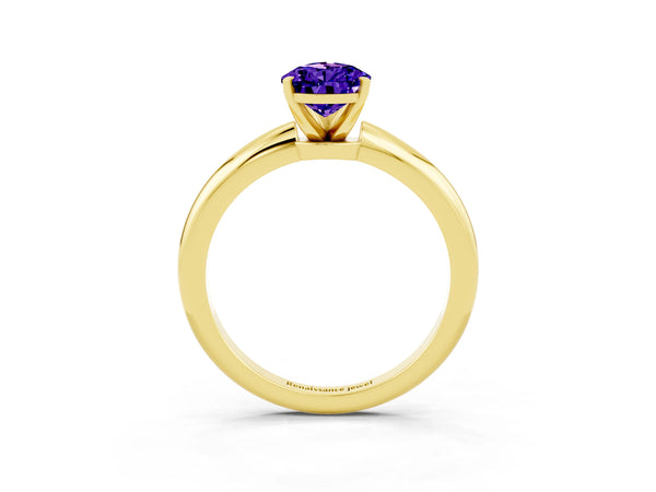 Yellow gold Pear Cut Tanzanite Solitaire Ring with Six-Prong Setting and Classic Band