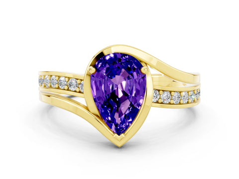 Yellow gold Pear Cut Tanzanite Solitaire Ring with Split Shank and Prong Setting