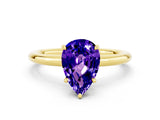 Yellow gold Pear Cut Tanzanite Solitaire Ring with Thin Band and Four-Prong Setting