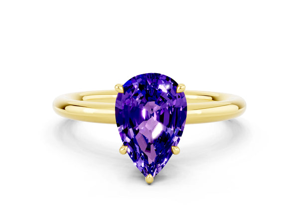 Yellow gold Pear Cut Tanzanite Solitaire Ring with Thin Band and Four-Prong Setting