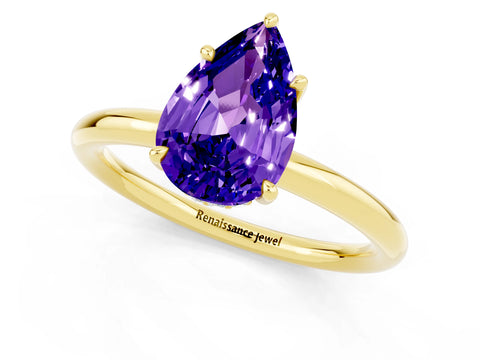 Yellow gold Pear Cut Tanzanite Solitaire Ring with Thin Band and Four-Prong Setting_1