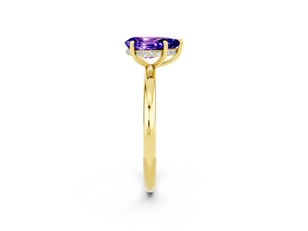 Yellow gold Pear Cut Tanzanite Solitaire Ring with Thin Band and Four-Prong Setting