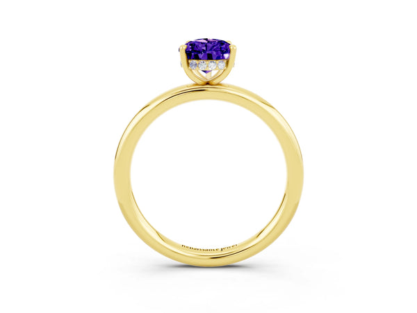 Yellow gold Pear Cut Tanzanite Solitaire Ring with Thin Band and Four-Prong Setting