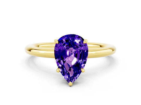 Yellow gold Pear Cut Tanzanite Solitaire Ring with Thin Band and Four-Prong Setting