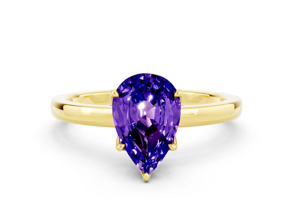 Yellow gold Pear Cut Tanzanite Solitaire Ring with Thin Band and Prong Setting