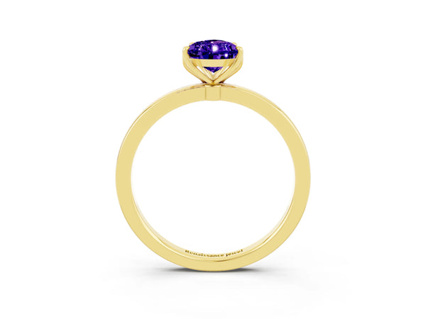 Yellow gold Pear Cut Tanzanite Solitaire Ring with Thin Band and Prong Setting