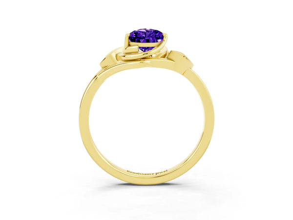 Yellow gold Pear Cut Tanzanite Solitaire Ring with Twist Band and Four-Prong Setting