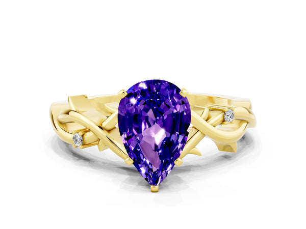 Yellow gold Pear Cut Tanzanite Solitaire Ring with Twisted Band and Prong Setting