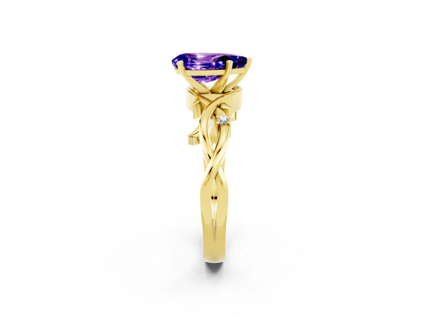 Yellow gold Pear Cut Tanzanite Solitaire Ring with Twisted Band and Prong Setting