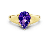 Yellow gold Pear Cut Tanzanite Solitaire Ring with Wide Band and Prong Setting