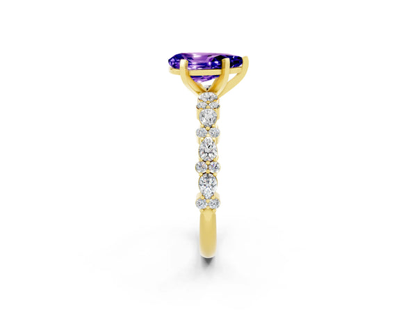 Yellow gold Pear Cut Tanzanite Side Stone Solitaire Ring with Round  and Four-Prong Setting