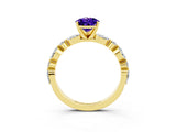 Yellow gold Pear Cut Tanzanite Solitaire with Side Stones on a Pavé Band and Four-Prong Setting_3