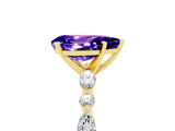 Yellow gold Pear Cut Tanzanite Solitaire with Side Stones on a Pavé Band and Four-Prong Setting_5