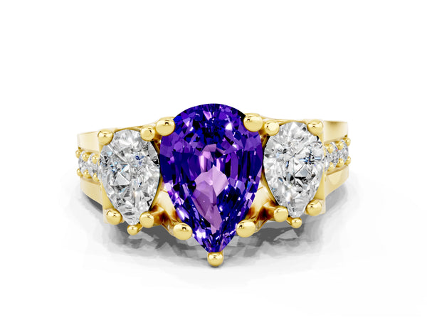 Yellow gold Pear Cut Tanzanite Three-Stone Ring with Channel Set Band and Four-Prong Setting