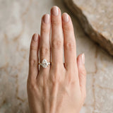Yellow gold Pear Cut Three-Stone Solitaire Ring with Round Accent Diamonds and Four-Prong Setting_49