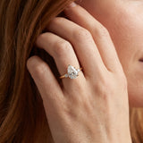Yellow gold Pear Cut Three-Stone Solitaire Ring with Round Accent Diamonds and Four-Prong Setting_51