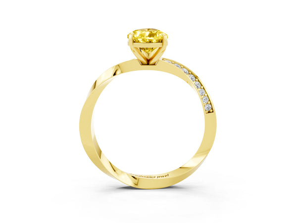 Yellow gold Pear Cut Yellow Sapphire Engagement Ring with Side Stone Accents and Four-Prong Setting