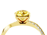 Yellow gold Pear Cut Yellow Sapphire Engagement Ring with Side Stone Accents and Four-Prong Setting_64