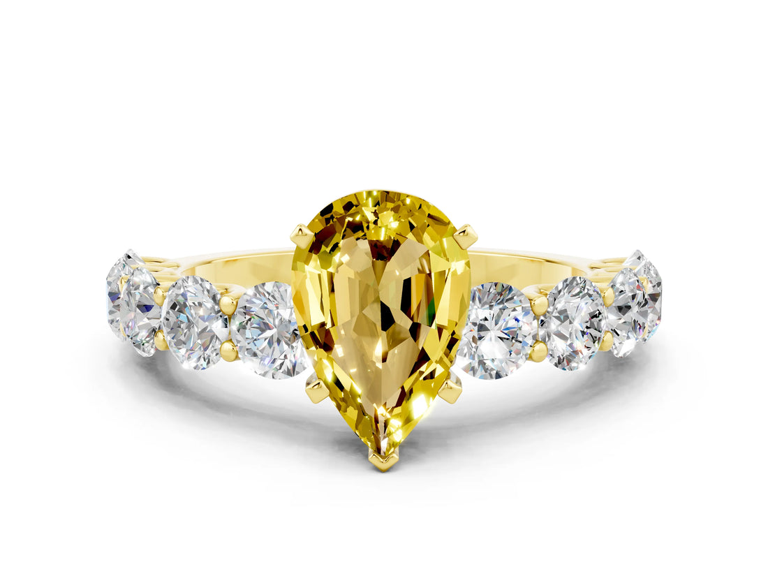 Yellow gold Pear Cut Yellow Sapphire Prong Setting with Side Stones on a Pave Band_24