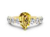 Yellow gold Pear Cut Yellow Sapphire Prong Setting with Side Stones on a Pave Band_24