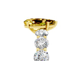 Yellow gold Pear Cut Yellow Sapphire Prong Setting with Side Stones on a Pave Band_29