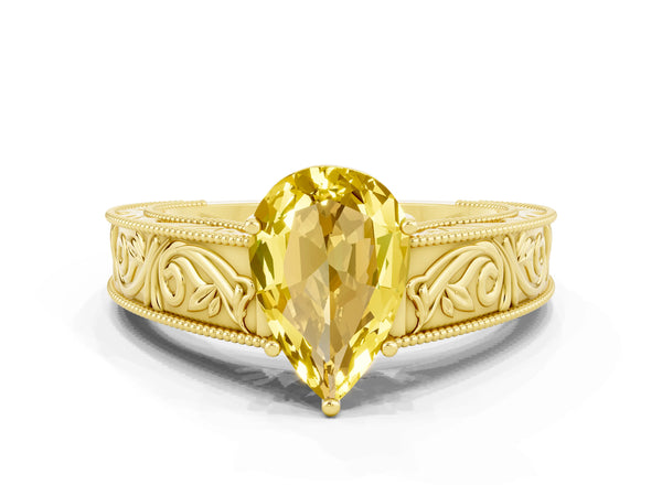 Yellow gold Pear Cut Yellow Sapphire Solitaire Ring with Engraved Band and Four-Prong Setting