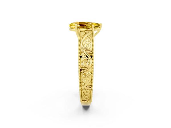 Yellow gold Pear Cut Yellow Sapphire Solitaire Ring with Engraved Band and Four-Prong Setting