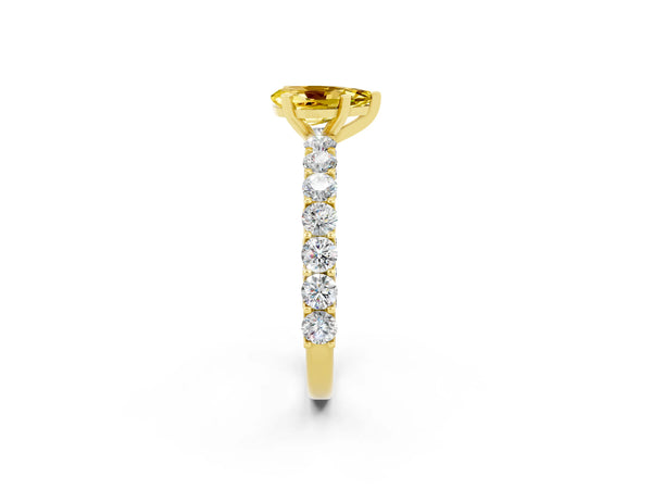 Yellow gold Pear Cut Yellow Sapphire Solitaire Ring with Shared Prong Pavé Band and Four-Prong Setting