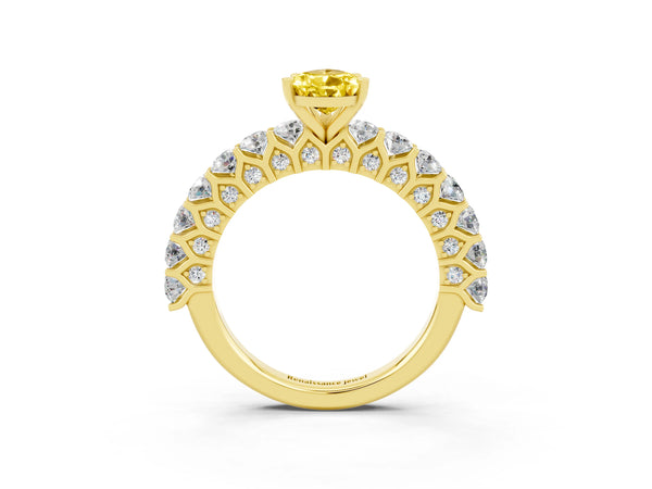 Yellow gold Pear Cut Yellow Sapphire Solitaire Ring with Shared Prong Pavé Band and Four-Prong Setting