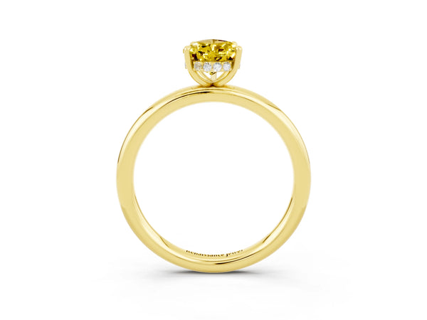 Yellow gold Pear Cut Yellow Sapphire Solitaire Ring with Thin Band and Four-Prong Setting