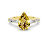Yellow gold Pear Cut Yellow Sapphire Solitaire with Side Baguettes and Channel Set Band_24