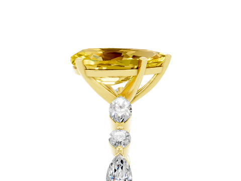 Yellow gold Pear Cut Yellow Sapphire Solitaire with Side Stones on a Pavé Band and Four-Prong Setting_29