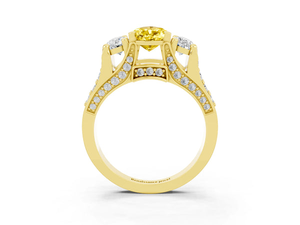 Yellow gold Pear Cut Yellow Sapphire Three-Stone Ring with Channel Set Band and Four-Prong Setting