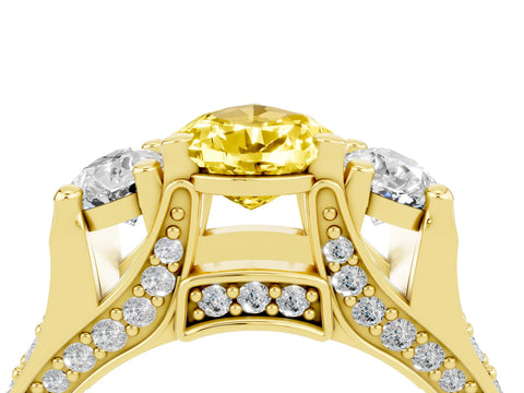 Yellow gold Pear Cut Yellow Sapphire Three-Stone Ring with Channel Set Band and Four-Prong Setting_4