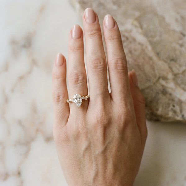 Yellow gold Pear Diamond Cluster Prong-Set Solitaire Ring
