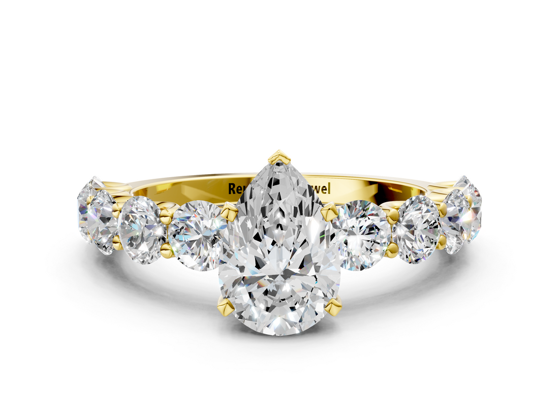 Yellow gold Pear Diamond Prong Setting with Side Stones on a Pave Band_146