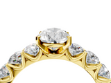 Yellow gold Pear Diamond Prong Setting with Side Stones on a Pave Band_150