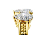 Yellow gold Pear Diamond Three-Stone Ring with Prong Setting and Textured Band_11