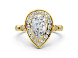 Yellow gold Pear Halo Diamond Engagement Ring with Twisted Band and Four-Prong Setting