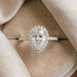Yellow gold Pear Halo Diamond Ring with Pavé Band and Three-Prong Setting_24