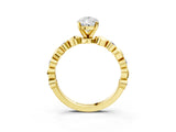 Yellow gold Pear Solitaire Bezel-Set Diamond Ring with Beaded Band and Four-Prong Setting_57